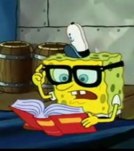 Spongebob con gli occhiali mentre legge