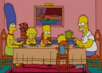 The Simpson family sitting at the table