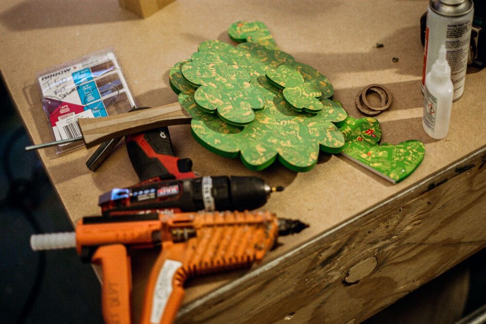 Tree props made with recycled Sprite labels. [photo: Nicholas Rotondi]